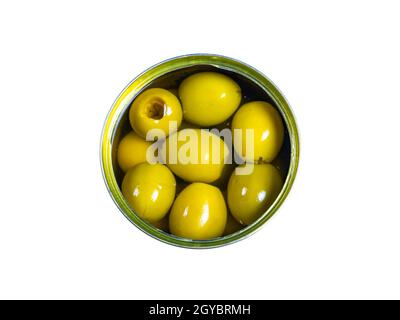 Green olives in a tin can on a white background. Green olive fruits. Olives berries. Olive fruits. Vegetables and fruits. Food photo. Canned food. Sna Stock Photo