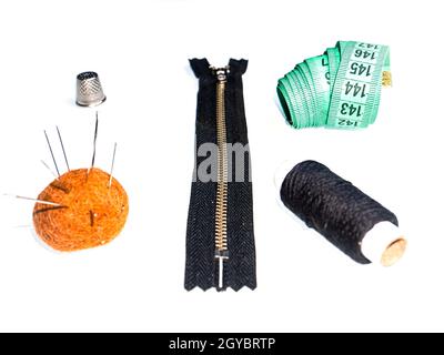 thread sewing needle centimeter scissors on a white background Stock Photo  - Alamy