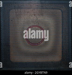 The texture of the black metal mesh of the speaker. Surface texture. Black color. Protective mesh. Acoustic speaker. Background image. Holes in the me Stock Photo