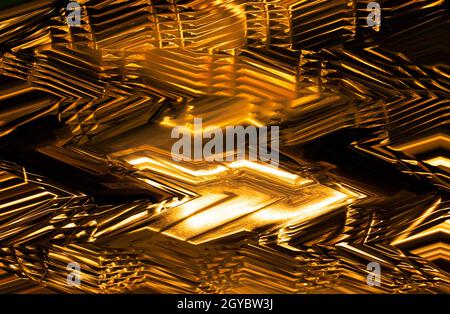 Abstract illustration of figured glass in gold tones. Textured image of figured glass with a pattern. Abstract illustration. Gold colors. Background i Stock Photo