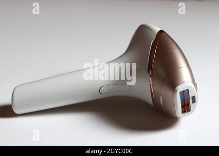 Closeup shot of a modern photo epilator for hair removal isolated on a white background Stock Photo
