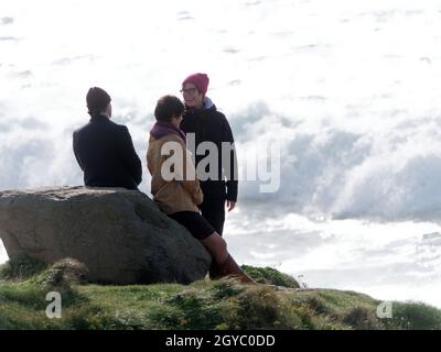 Cornwall UK, Newquay. Location filming at Fistral beach. The two leading actors including Julia Bremerman and Tobias Van Dieken in the romantic drama are seen together and individually on and off set. German film crew FFP New media are producing a Rosamunde Pilcher story called “Love is unpredictable”. The show is commissioned by German TV network ZDF. The series is so popular in Germany that the FFP maintain a permanent base in Newquay and film in Cornwall every year producing two or three stories each season. 7th, October, 2021 Stock Photo