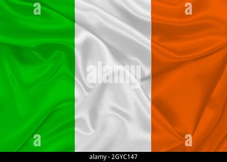 3D Flag of Ireland on wrinkled fabric. Stock Photo