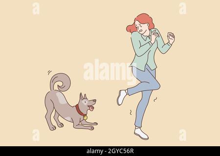 Fear of dogs animals concept. Young stressed girl feeling afraid running away from friendly playing dog outdoors vector illustration Stock Photo