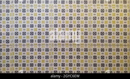 Square Ceramic Tile with Gray and Yellow Floral Patterns. High quality photo Stock Photo
