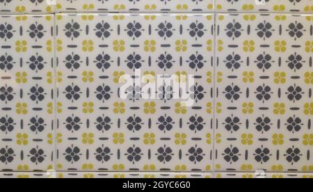 Square Ceramic Tile with Gray and Yellow Floral Patterns. High quality photo Stock Photo