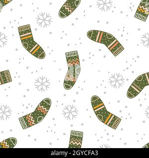 Green socks and snowflakes on a black background. Vector seamless pattern Stock Vector