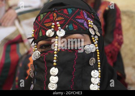 Nablus, Palestine. 07th Oct, 2021. A Palestinian woman seen wearing the ...