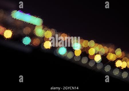 Light from cars and buildings with a defocused view. Stock Photo