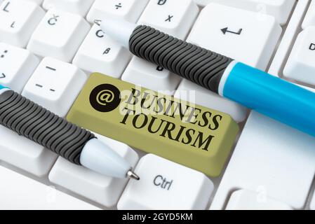 Handwriting text Business Tourism, Business showcase activity of leaving one s is native place for business purpose Typist Creating Company Documents, Stock Photo