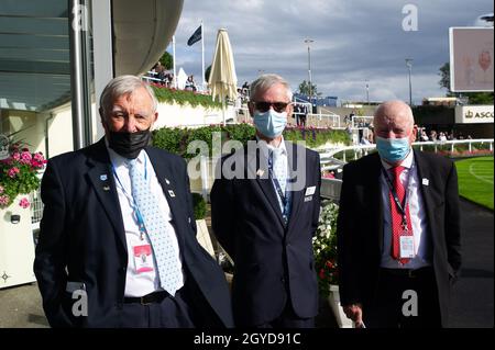 Ascot, Berkshire, UK. 1st October, 2021. Stewards in the Parade Ring at Ascot Racecourse wear their face masks. Credit: Maureen McLean/Alamy Stock Photo