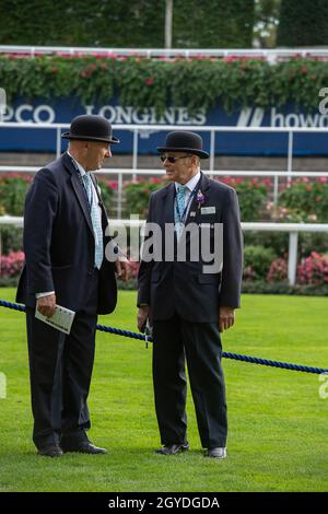 Ascot, Berkshire, UK. 1st October, 2021. Stewards wear their traditional bowler hats whilst on duty at Ascot Races. Credit: Maureen McLean/Alamy Stock Photo