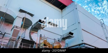 Air flow system of factory. Industrial ventilation. Air flow system of manufacturing building. Stainless steel pipe of ventilation system. Plant facto Stock Photo