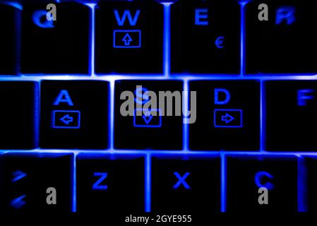 Backlit keyboard detail illuminated in the dark Stock Photo