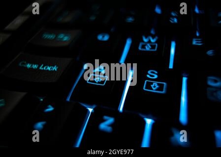 Backlit keyboard detail illuminated in the dark Stock Photo