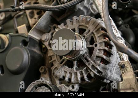 Alternator car engine detail in a workshop Stock Photo
