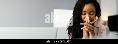 African American Woman Praying. God Seeking Prayer Stock Photo