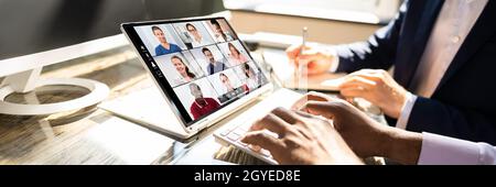Webinar Meeting In Office Learning On Hybrid Tablet Stock Photo