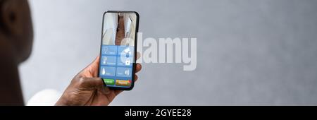 Smart Security System And CCTV Camera On Phone Stock Photo