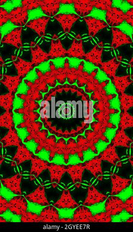 Kaleidoscope in christmas colors of red and green. Happy christmas 2022 pattern Vertical image. Stock Photo