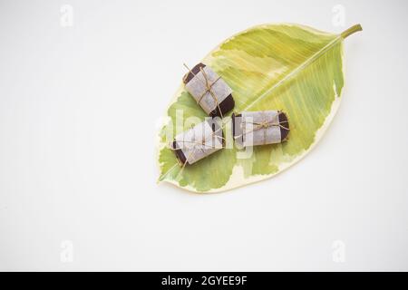 useful homemade sweets from different types of nuts decorated with kraft paper. Stock Photo