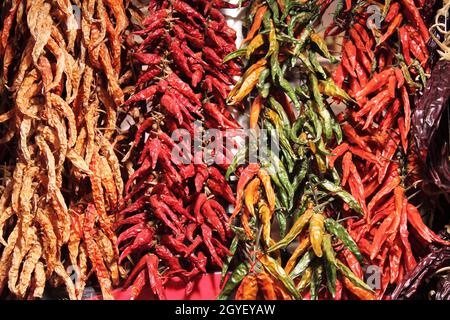 Red hot chili peppers for sale in a greengrocery Stock Photo