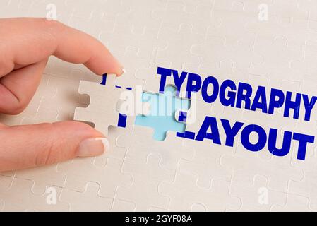 Writing displaying text Typography Layout, Business showcase theory and practice of letter and typeface design Building An Unfinished White Jigsaw Pat Stock Photo