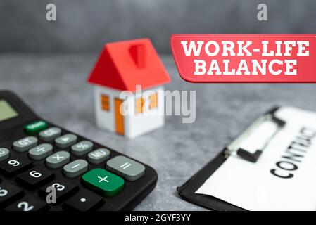 Hand writing sign Work Life Balance, Word Written on time allocated for work and aspects of life are equal Buying New House Ideas, Property Insurance Stock Photo