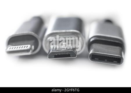 Three types of peripheral  cables connectors for charging or data. Concept EU rules to change universal charge plug to USB C Stock Photo