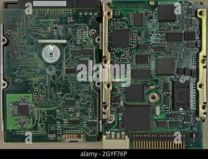 Printed electronic circuit board computer chips and other components on hard drives motherboards Stock Photo