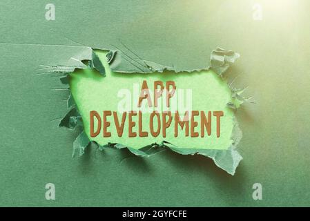 Text showing inspiration App Development, Business idea the act or process by which a mobile app is developed Thinking New Writing Concepts, Breaking Stock Photo