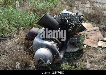 The helicopter engine which is pulled out outside. Spare parts and details of a design of helicopters. Stock Photo
