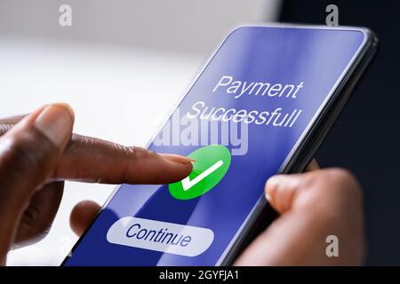 Confirmed Online Rent Payment. African American Woman Using Money Transfer Stock Photo