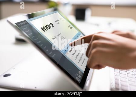 E Invoice On Laptop. Online Electronic Bill Management Stock Photo