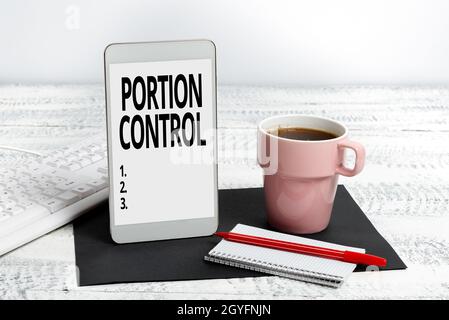 Sign displaying Portion Control, Business overview knowing the correct measures or serving sizes as per calorie Wireless Communications Voice And Vide Stock Photo