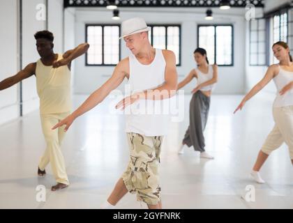 Dancers training modern dance movements Stock Photo
