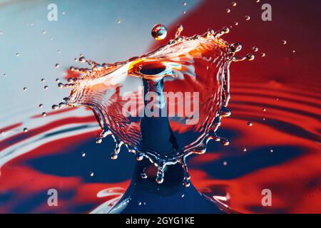 Blue and red water with umbrella mushroom of water Stock Photo