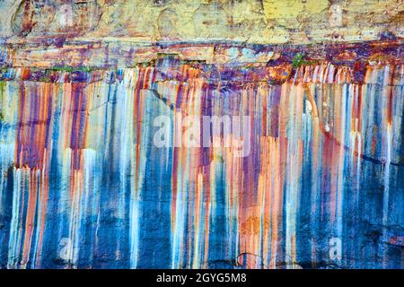 Pictured Rocks with blue, red, yellow and green stones Stock Photo