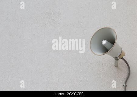 loudspeaker setting on the wall for present News in public place Stock Photo