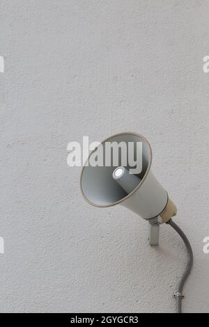 loudspeaker setting on the wall for present News in public place Stock Photo