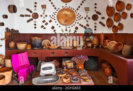 A traditional kitchen with traditional pottery in a museum in TLAQUEPAQUE - GUADALAJARA, MEXICO Stock Photo