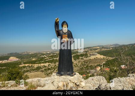 LEBANON, MOUNT LEBANON, ANNAYA, ED DAIDABE, STATUE OF SAINT-CHARBEL NEAR SAINT-MARON MONASTERY AND THE HERMITAGE OF SAINT-CHARBEL Stock Photo