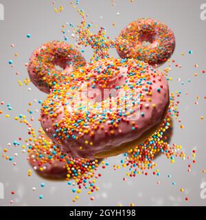 Flying sweet donuts with sprinkels on grey background Stock Photo