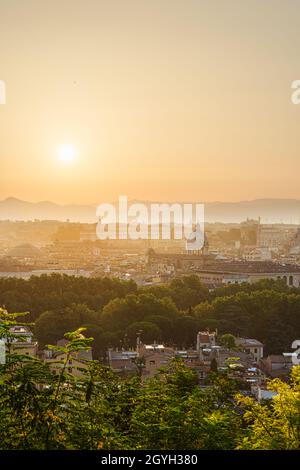 Panoramic view of Rome, Italy, at sunrise, from the Janiculum Hill viewpoint, with Trastevere district, Villa Medici, Spanish Steps, Pantheon, Quirina Stock Photo