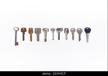 collection of different house keys isolated on white background Stock Photo
