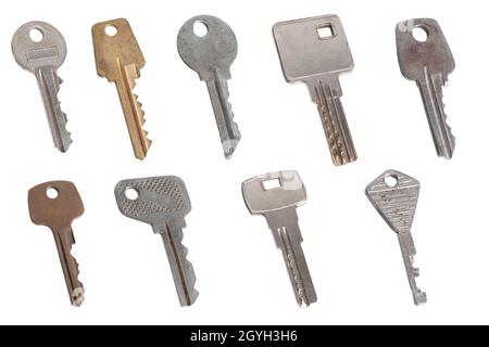 collection of different house keys isolated on white background Stock Photo