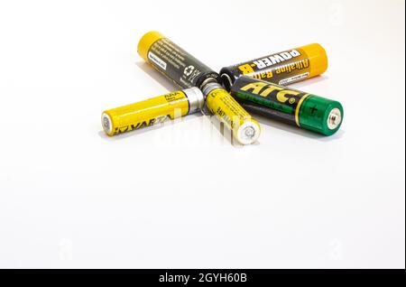 Five used old batteries on a white background,isolated Stock Photo