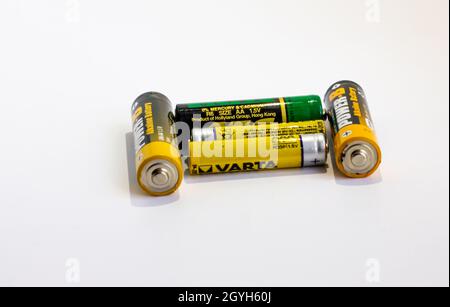 Five used old batteries on a white background,isolated Stock Photo
