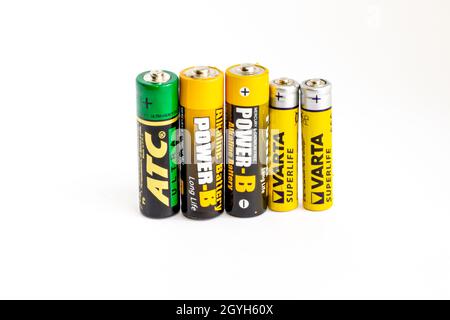 Five used old batteries on a white background,isolated Stock Photo