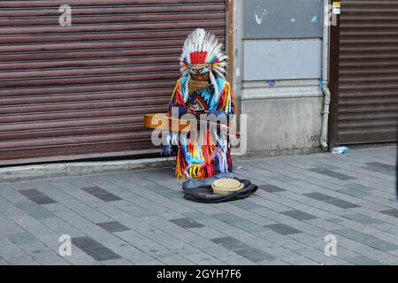 Indian music player in the street of Istanbul Stock Photo